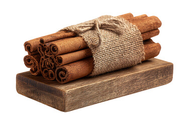 Aromatic cinnamon sticks tied with burlap on a wooden board isolated on transparent background