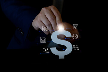 Businessman holding a glowing dollar sign with digital finance, fintech icons, investment, banking, and money management technology.
