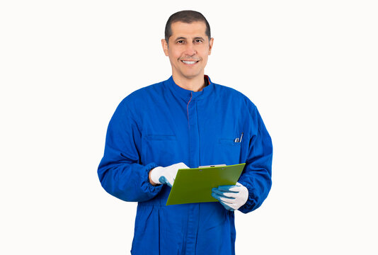 Portrait of smiling male repairman holding wrench and clipboard with isolated on white background