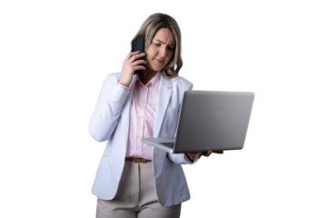 Stressed businesswoman multitasking with phone call and laptop