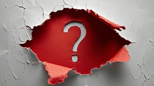 Torn White Paper Revealing Red Question Mark.