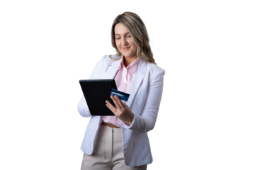 Woman holding credit card making online payment on tablet