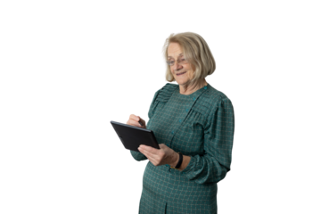 Senior woman smiling and using digital tablet