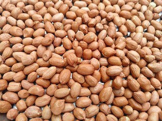 Close up shot of pile of fresh peanut seed.