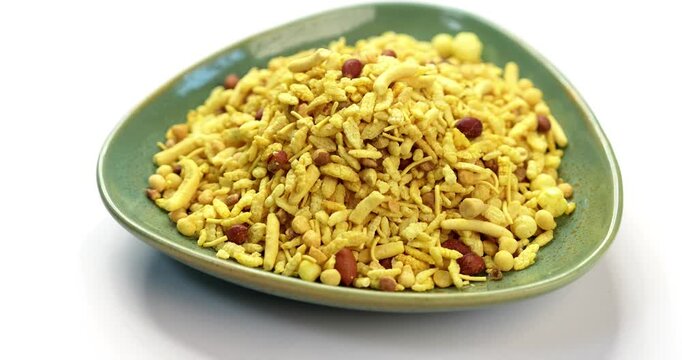Bombay mix or Chanachur or Chiwda or farsan also known as khatta meetha chivda is an Indian snack mix, popular tea-time food from India