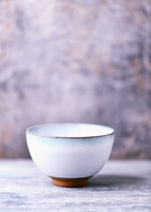 Traditional japanese ceramic on rustic wooden background. Soft focus. Copy space.	