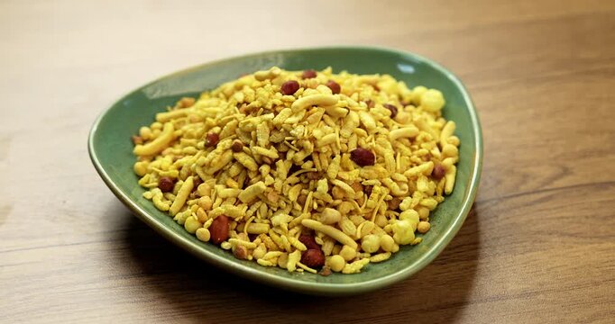 Bombay mix or Chanachur or Chiwda or farsan also known as khatta meetha chivda is an Indian snack mix, popular tea-time food from India