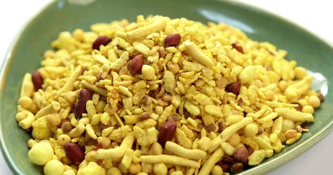 Bombay mix or Chanachur or Chiwda or farsan also known as khatta meetha chivda is an Indian snack mix, popular tea-time food from India