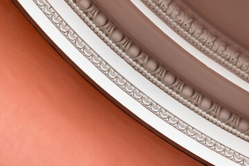 Intricate close-up of a beaded plaster ceiling molding