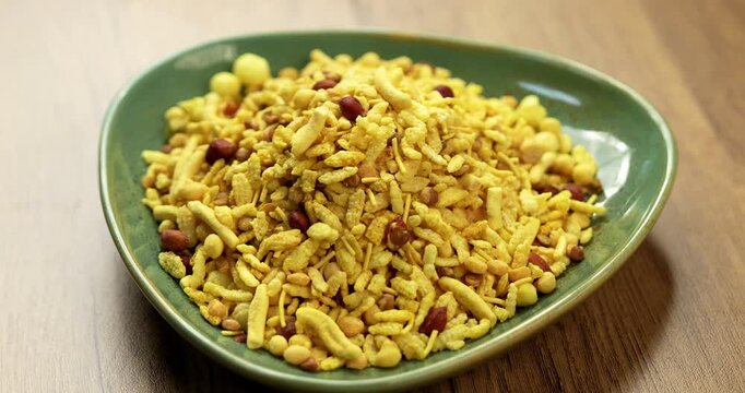 Bombay mix or Chanachur or Chiwda or farsan also known as khatta meetha chivda is an Indian snack mix, popular tea-time food from India