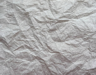 Crumpled paper texture. Realistic white crumpled paper background. Horizontal wrinkled empty notepad sheet