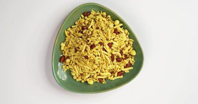 Bombay mix or Chanachur or Chiwda or farsan also known as khatta meetha chivda is an Indian snack mix, popular tea-time food from India