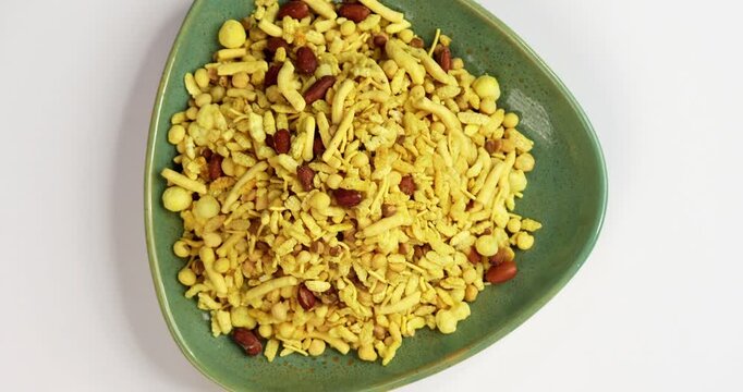 Bombay mix or Chanachur or Chiwda or farsan also known as khatta meetha chivda is an Indian snack mix, popular tea-time food from India