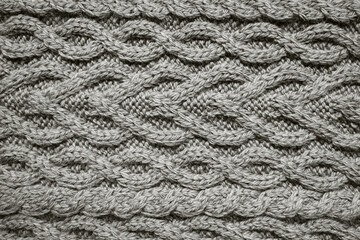 cable knit sweater pattern. Cozy nordic background. Ornate wool texture color of 2026 year cloud white