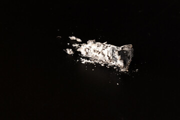 cigarette on black background ash