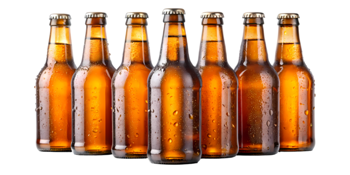 A row of six brown glass beer bottles with condensation on a black background in a studio setting