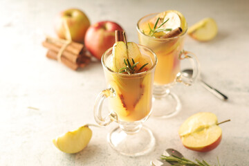 Warm apple autumn drink with cinnamon