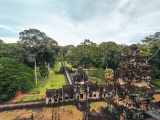 Angkor Thom s Baphuon Temple From Above With Galleries, Moat And Forest