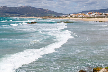 Tarifa, Spain - April 18, 2025: Sea views in Tarifa, right at the point of the Strait of Gibraltar where the Mediterranean Sea meets the Atlantic Ocean on one side in Tarifa, Spain