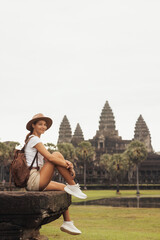 Smiling Backpacker At Angkor Wat Temple, Cambodia Travel Advertising Photo