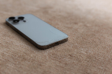 Seller Displays Smartphone With Noticeable Scuff Marks And Textured Background For Reselling Purposes