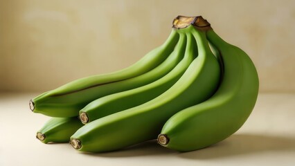 Green bananas bunch on a neutral surface