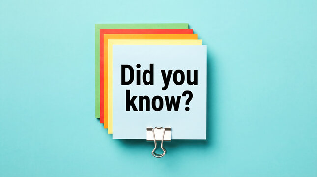 Colorful sticky notes with a bold question, showcasing a creative workspace, inviting curiosity and engagement in a vibrant environment