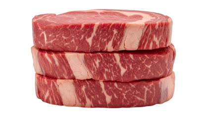 Stack of three premium raw ribeye beef steaks with rich marbling, showcasing fresh, high-quality meat ready for cooking or grilling, isolated on transparent background