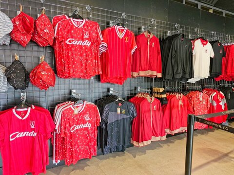 ANFIELD STADIUM, LIVERPOOL-JULY 15, 2025:Retro Liverpool football club (LFC) jerseys on sale at official store at Anfield Stadium in Liverpool. LFC will switch to Adidas brand starting 2025 26 season.