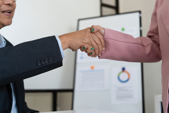 Senior businessmen calculating investment.