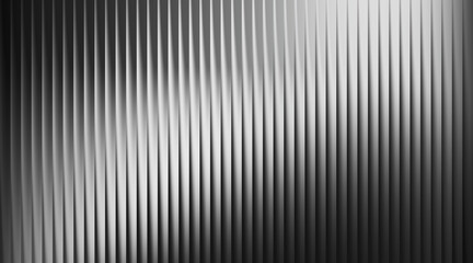 Obraz premium Monochromatic Abstract Vertical Ribbed Metallic Surface with Strong Contrast background texture