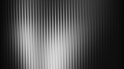 Obraz premium Monochromatic Vertical Ribbed Texture with Subtle Light Reflections abstract background