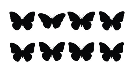 Simple black silhouettes of butterflies arranged in rows against a white background © MdNirob