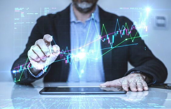 Digital Market Insights: Professional Businessman Interacting with Luminous Graphic  Data Overlaid on Office Scene