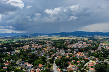 Fototapeta premium Aerial drone view of Paczkow. A city in the Opole province, in Nysa county, urban rural commune of Paczkow. Panorama of the city of Paczkow and Paczkowski Reservoir from a drone flight