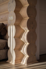 A close-up of the logs of a house in the interior. The house is made of northern pine with a diameter of 330 mm.