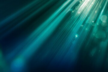Intense illumination streams through deep turquoise water creating ethereal light rays