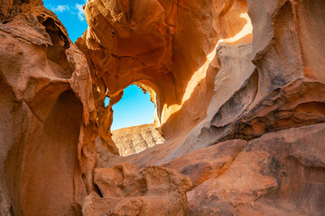 The Arco de las Peñitas is an impressive natural rock arch formation located in the Barranco de las Peñitas ravine within the Betancuria Rural Park in Fuerteventura