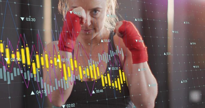 Boxing woman wearing dark tank holding fists up at gym, with red wraps and data overlay - Powered by Adobe
