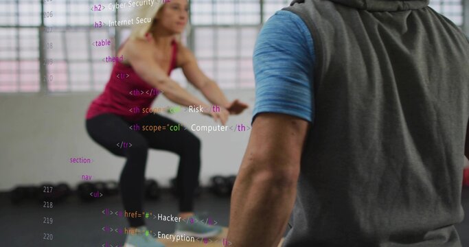 Squatting woman in red tank top performing step squats in gym, with kettlebells and code overlay - Powered by Adobe