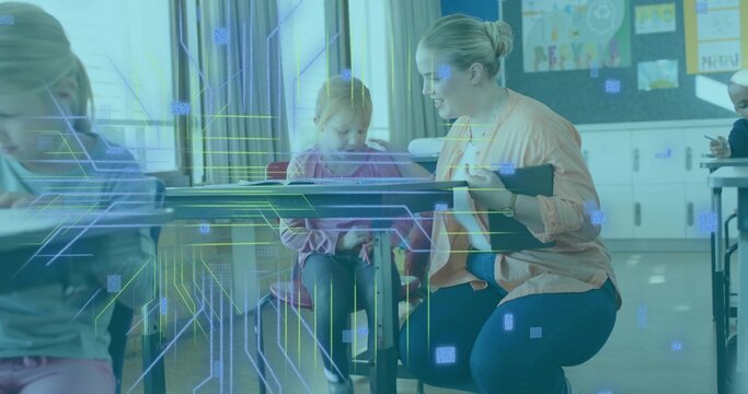 Kneeling teacher leaning toward student in pink hoodie in class holding clipboard with tech overlay