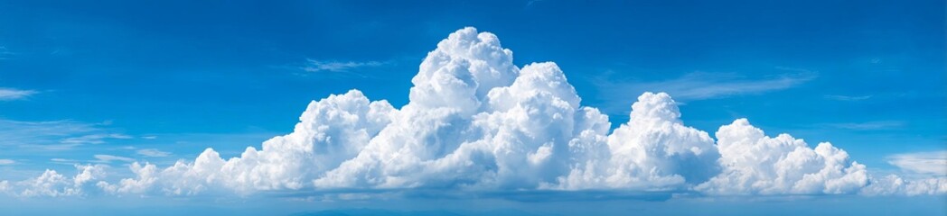 A beautiful sunny sky filled with fluffy white clouds against a deep blue backdrop.