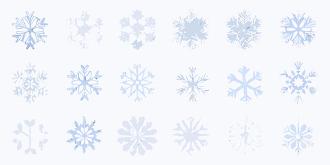 Collection of light blue snowflakes on white background for winter season