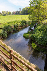 Fototapeta premium The young River Chelt at Boddington, Gloucestershire, England UK