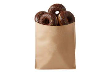 Brown paper bag overflowing with delicious chocolate frosted donuts, isolated on transparent background