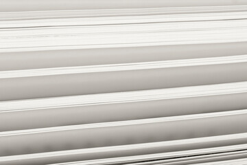 Obraz premium White stack of paper with visible layered edges in abstract geometric composition, minimalistic design background