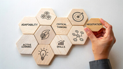 Collection of wooden hexagonal blocks, each block displays a different icon and text related to skills and attributes