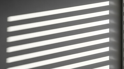 Sunlight streaming through blinds casting shadows on a wall.