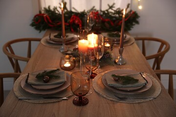Festive table setting with Christmas decor indoors, closeup