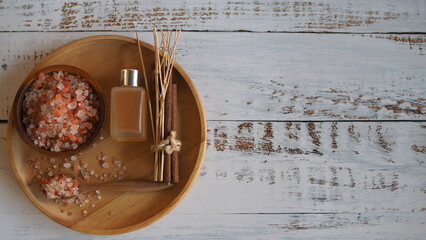Top view Himalayan pink salt crystals on wooden board, scrub spa therapy healthy.spa relax
